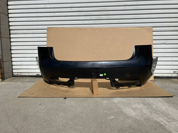 OEM 2024-2025 Tesla Model 3 Highland Rear Bumper Cover w/dent and scratches