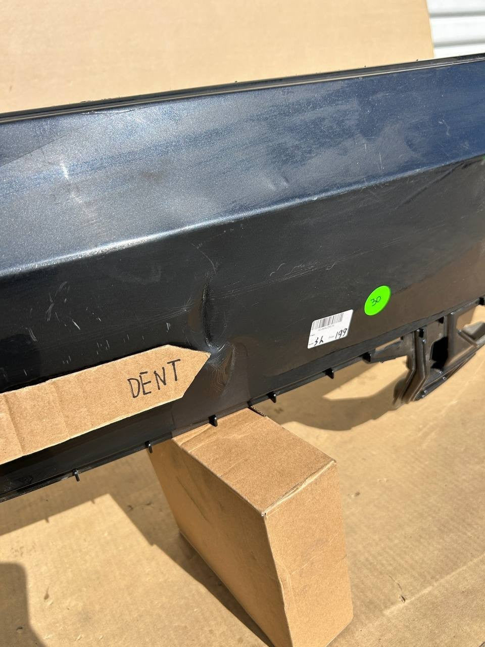 OEM 2024-2025 Tesla Model 3 Highland Rear Bumper Cover w/dent and scratches